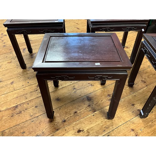 545 - A Set of Four Japanese Hardwood Whatnot Tables with inset Top Panels, Key Boarded Tops & Scroll Feet... 