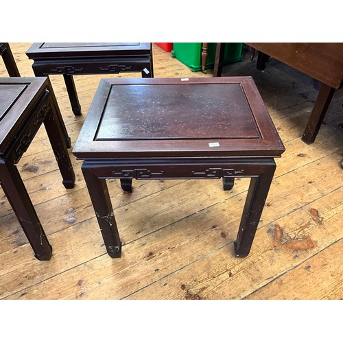 545 - A Set of Four Japanese Hardwood Whatnot Tables with inset Top Panels, Key Boarded Tops & Scroll Feet... 