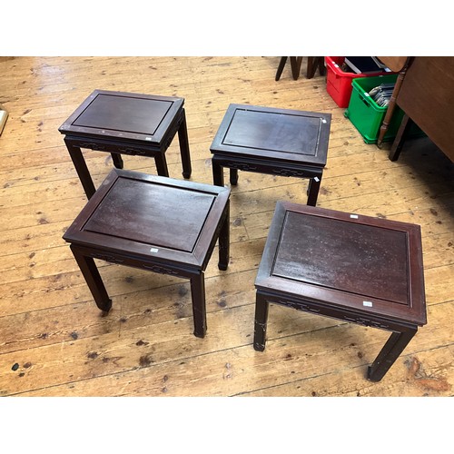 545 - A Set of Four Japanese Hardwood Whatnot Tables with inset Top Panels, Key Boarded Tops & Scroll Feet... 