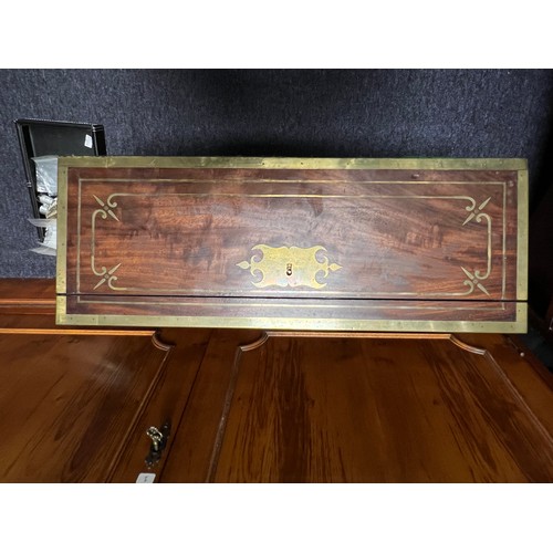 713 - An Early Victorian Campaign Writing Slope fitted with Brass edges, Brass inlay, quartered Corners, R... 