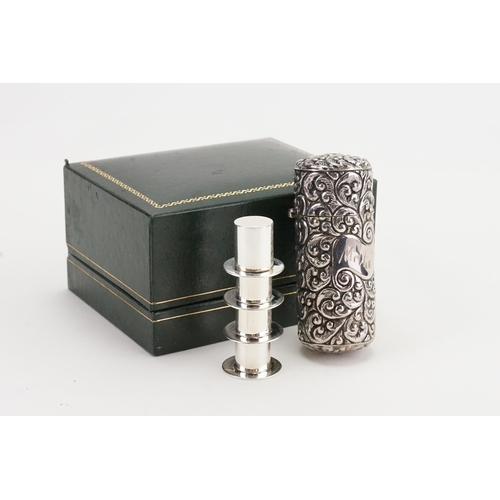 4 - A Silver coloured embossed Perfume Bottle Case containing a Silver Coloured Sewing Set & a Cigarette... 