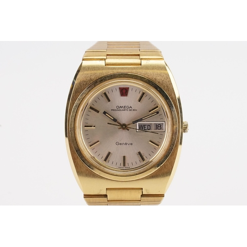 210 - A gentleman's Omega megaquartz 32 KHZ wrist watch, Geneve day date, champagne dial.