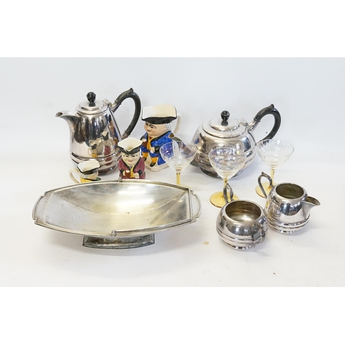 70 - A Four Piece Silver Plated Tea Set, a Bread Basket, Toby Jugs, etc.