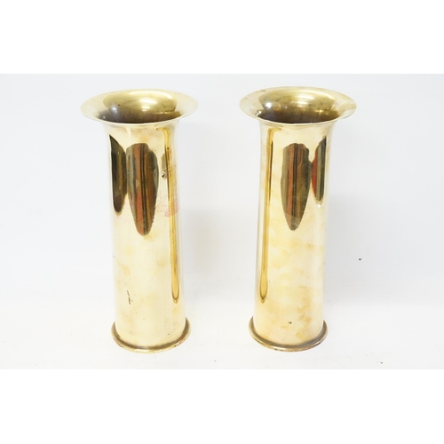 279 - A Pair of Flare Lipped Brass Shell Cases. Measuring: 22cms High.