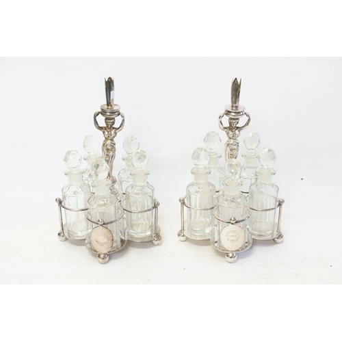 82 - Two Silver Plated Condiment Sets cast with a figure of a young girl holding a Flower Holder.