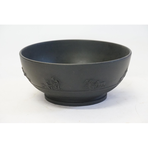 791 - A Black Basalt Bowl with Classical decoration.