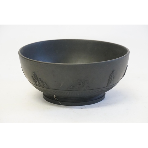 791 - A Black Basalt Bowl with Classical decoration.