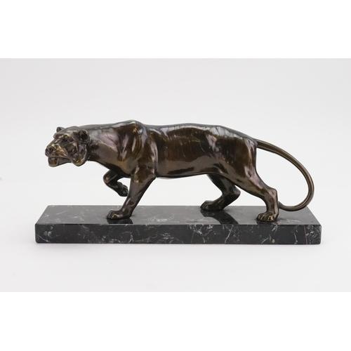 865 - A Study of a Tiger on a Marble Base.