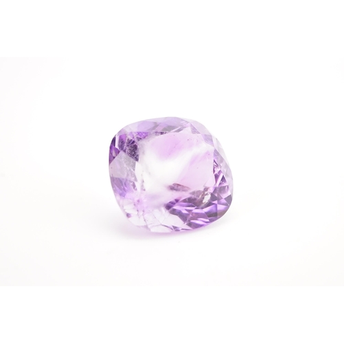 135 - A large 18mm x 18.6mm x 12.85mm cushion cut amethyst. Weight 5.5g.