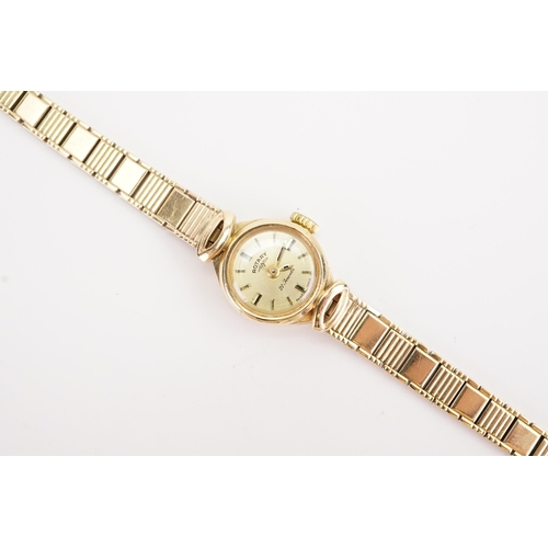 204 - A ladies 9ct gold Rotary wristwatch, 9ct gold strap. Weight without mechanism 11.4g. (includes glass... 