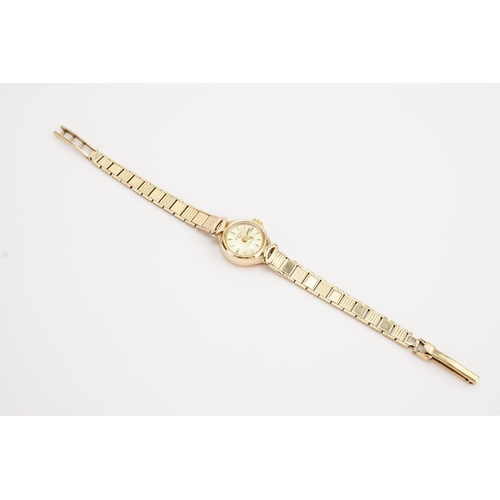 204 - A ladies 9ct gold Rotary wristwatch, 9ct gold strap. Weight without mechanism 11.4g. (includes glass... 