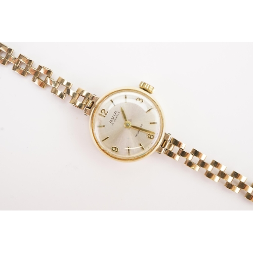 206 - A ladies 9ct gold Avia watch, weight without mechanism 7.9g. (includes glass).