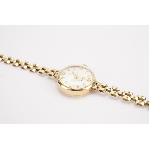 206 - A ladies 9ct gold Avia watch, weight without mechanism 7.9g. (includes glass).