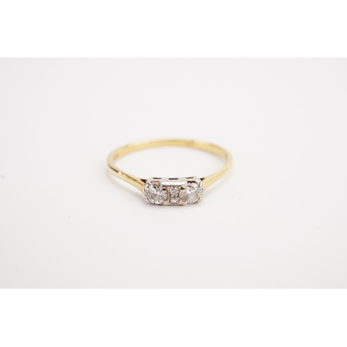 110 - A 18ct gold diamond set ring, largest diamond approx 0.15ct. Weight 2.4g. Size T.