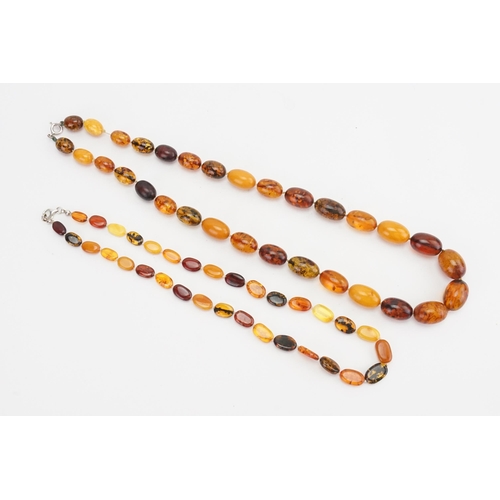 131 - Two amber bead necklaces. Weight 63.9g.