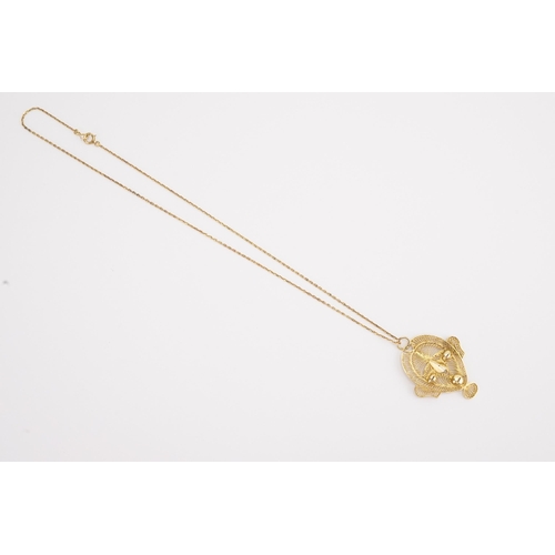 114 - A 14ct gold thin chain (1.5g). Along with a filigree pendant.