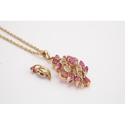 120 - A 9ct gold ruby set pendant, hung on a 9ct gold chain. Along with a single earring. Weight 5.9g.