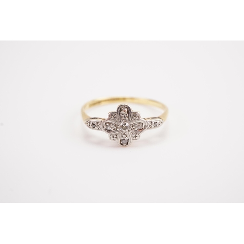 127 - A 18ct and platinum set diamond ring, in the art deco design. Largest diamond approximately 0.05ct. ... 