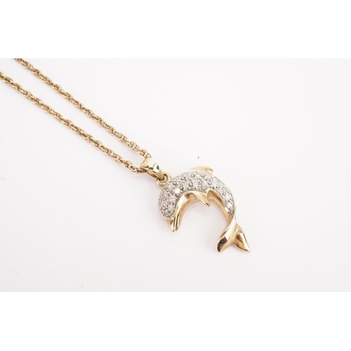 124 - A 9ct gold chain, hung with a 9ct gold diamond dolphin. Weight 4.9g.