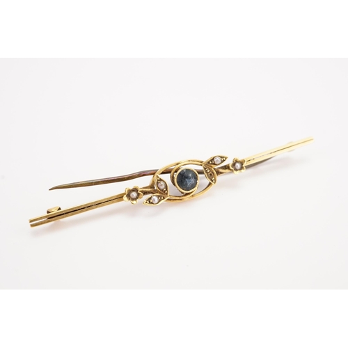 148 - A 18ct gold seed pearl brooch. Weight 4g.