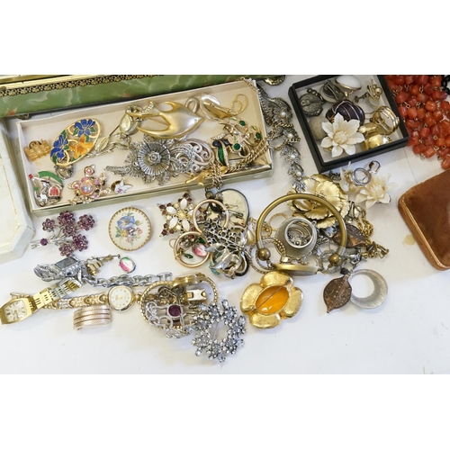 162 - A collection of costume jewellery, to include bangles, beads, watches, earrings etc.