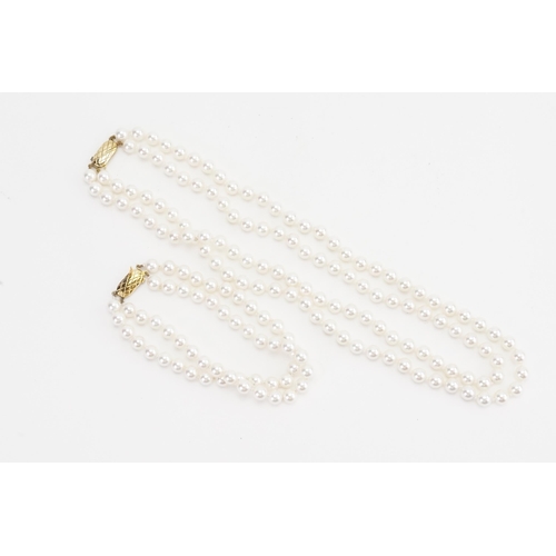 150 - A 9ct gold clasp set of pearls, along with a 9ct gold clasp pearl bracelet.