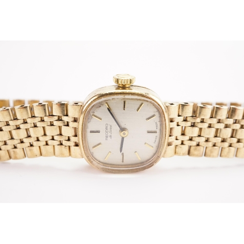 200 - A ladies 9ct gold Record watch, 9ct gold strap. Weight without mechanism 20g including glass.