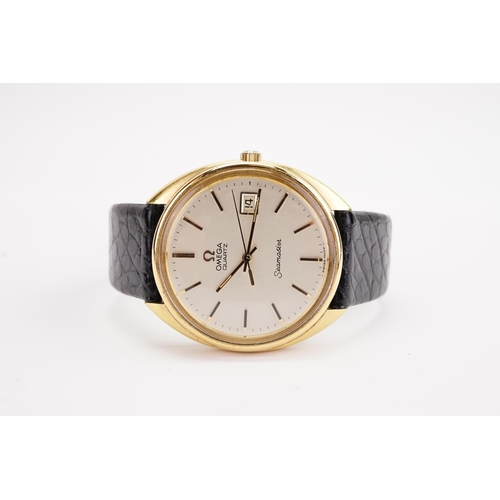 203 - A Omega Seamaster Quartz watch, gold plated face, black crocodile strap, original Omega buckle.  Con... 