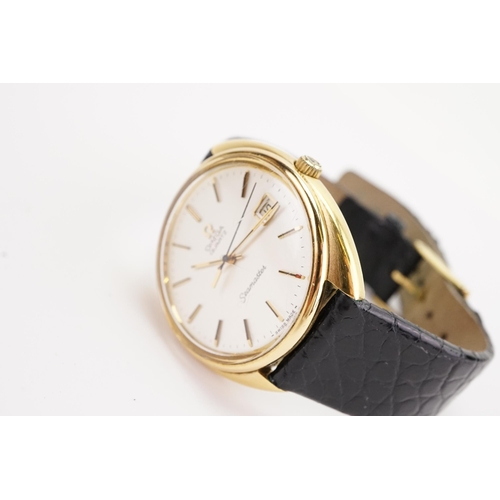 203 - A Omega Seamaster Quartz watch, gold plated face, black crocodile strap, original Omega buckle.  Con... 