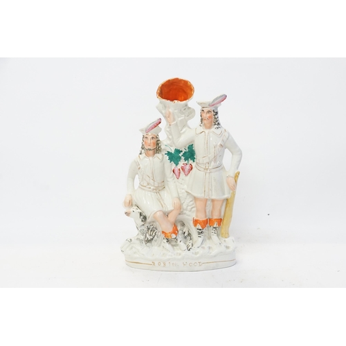 838 - A Staffordshire Flat Back Figure decorated with two men & a Dog entitled 