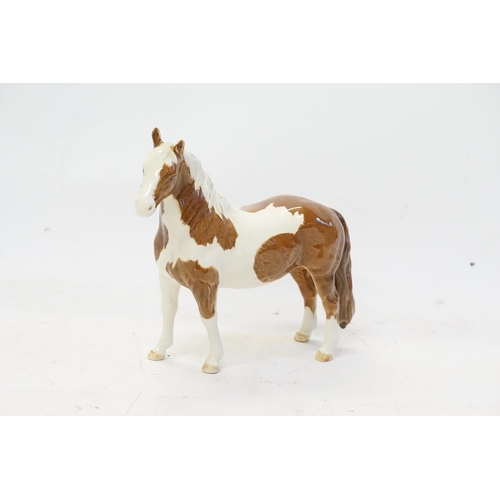 844 - A Beswick Brown & White Glazed Gelding with White Socks & a mottled Finish.