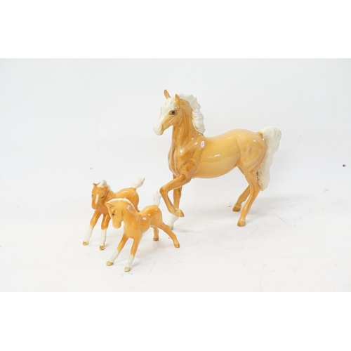 847 - A Beswick Study of a Chestnut Foal prancing & two similar smaller studies.