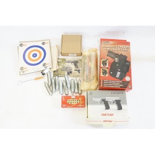 287 - A Box of BB Gun accessories including Gas Bottles, Targets, a Boxed Holster, Empty Box for hand gun,... 