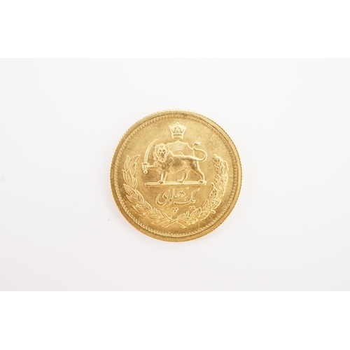 264 - A Rare 1 Pahlavi Mohammed Reza Shah 1945 - 1979 gold coin. Weight 8.1g. Persian Mint. Fineness 900.0... 