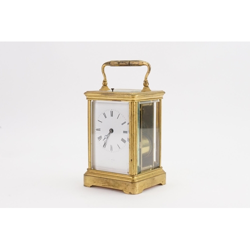 223 - A large brass mounted carriage clock.