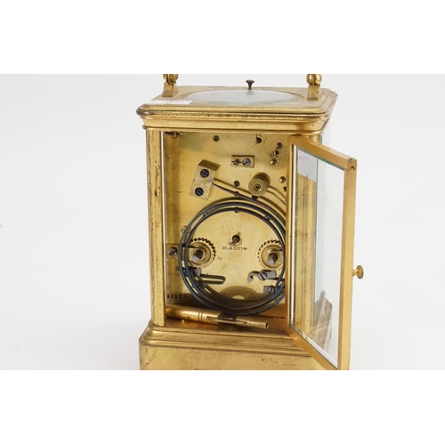 223 - A large brass mounted carriage clock.