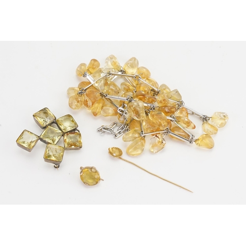 168 - A unmarked citrine earring, along with a similar brooch, bead necklace, a foreign gold stick pin 1g.