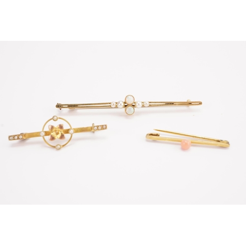 153 - A 9ct gold coral set brooch, along with a 9ct gold seed pearl brooch, and a opal and seed pearl broc... 