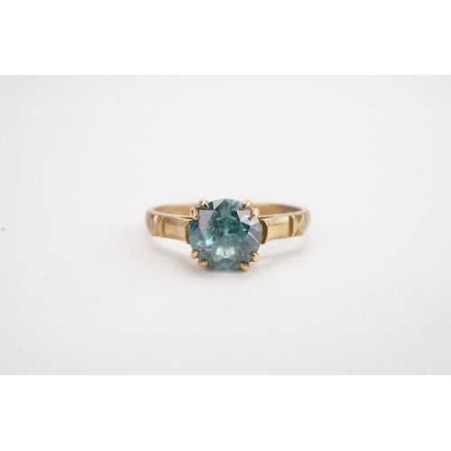 156 - A 14k gold Zircon mounted ring. Weight: Size: