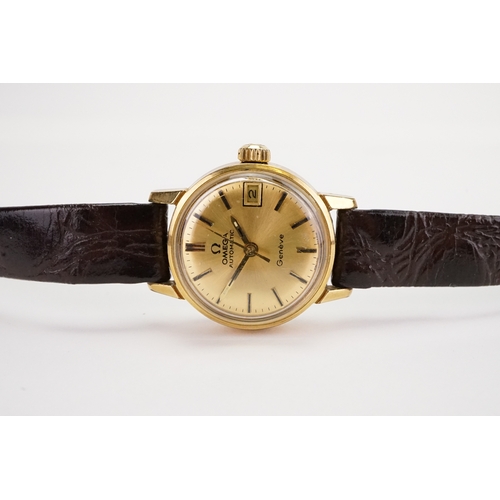 196 - A Ladies Omega Geneve Automactic with Gold Colour Dial & black leather strap.