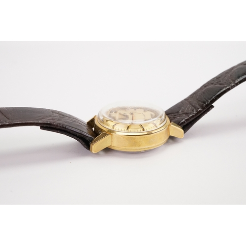 196 - A Ladies Omega Geneve Automactic with Gold Colour Dial & black leather strap.