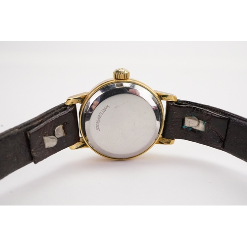 196 - A Ladies Omega Geneve Automactic with Gold Colour Dial & black leather strap.