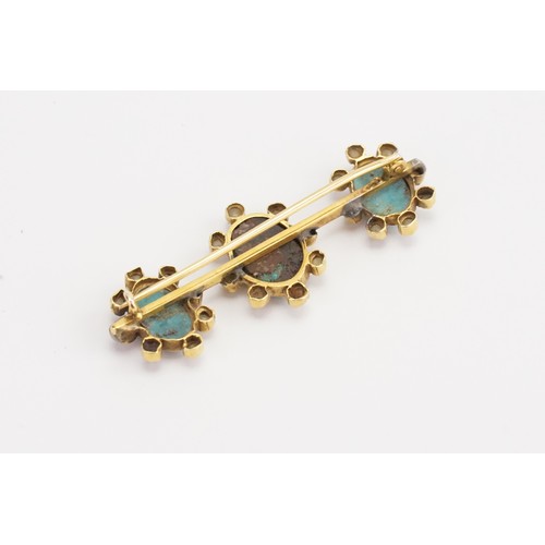 154 - A gold coloured turquoise and seed pearl set brooch. Weight 7.1g.