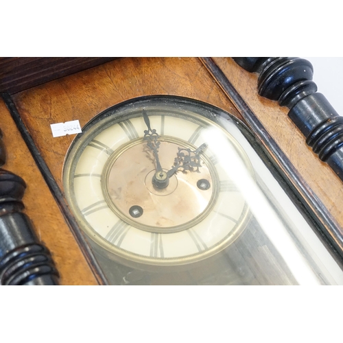 225 - A Late 19th Century Austrian design Wall Clock with stained black columns, Swan Neck Pedestal with a... 