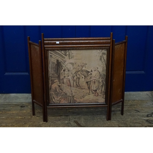 463 - A Needlework Tapestry in a Folding Frame.