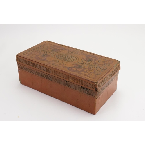 655 - A Pair of Chinese Design Red & Gold Boxes decorated with Dragons & a Red Lacquered interior. Measuri... 