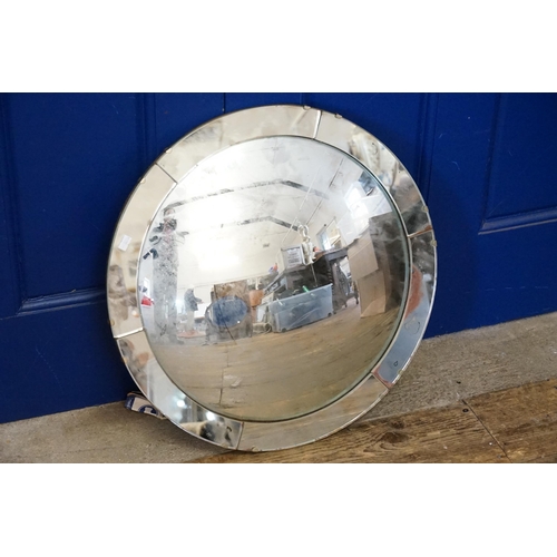 544 - A 1950s Convex Glass Wall Mirror. Measuring: 54cms.