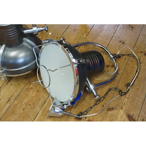 562 - A Set of Three Industrial Chrome & Grey Ceiling Lamps. Measuring: 57cms high x 40cms across.