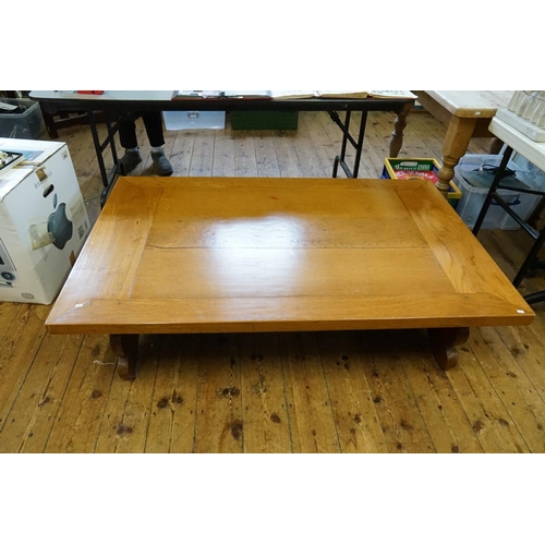 467 - A Large Continental Oak Low Down Coffee Table with Carved Sides. Measuring: 160cms long x 100cms acr... 