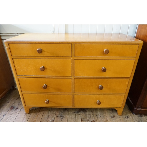 469 - A Late 1930s Blond Maple Haberdashers Chest of Eight Drawers. Measuring: 130cms across x 54cms deep ... 